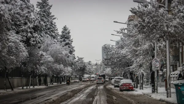 Snow-covered city street symbolizing a slow, steady debt payoff journey