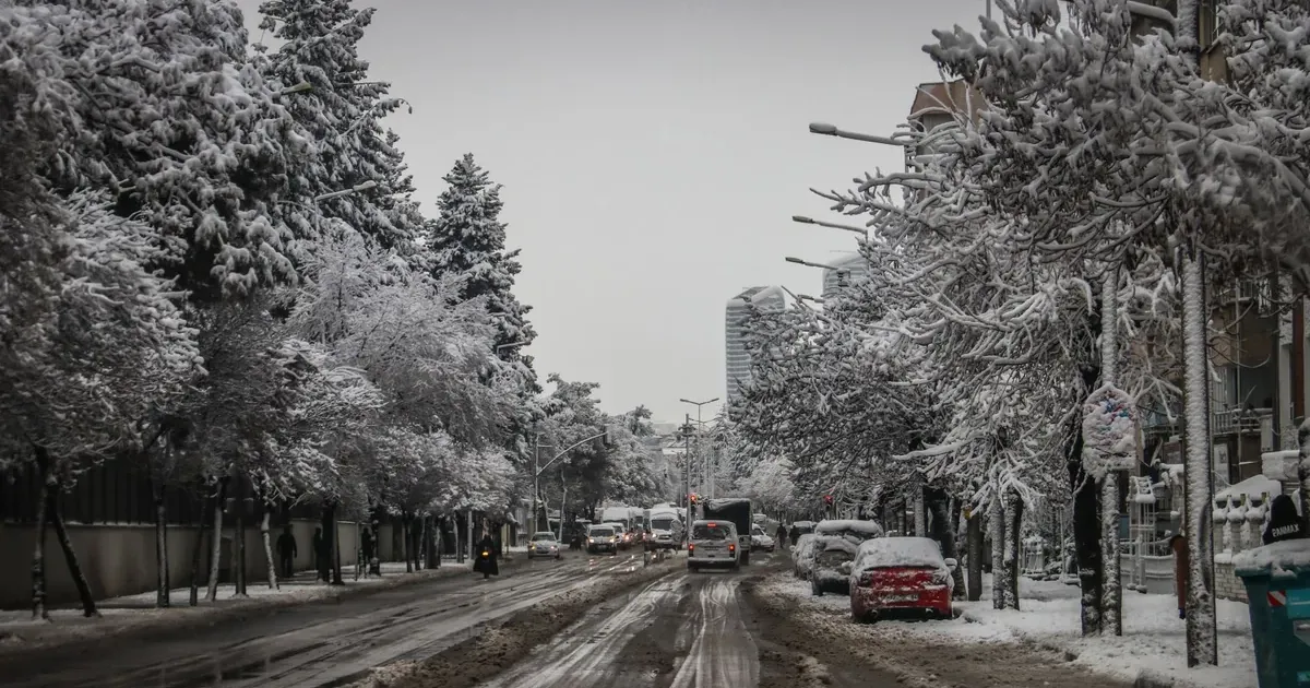 Snow-covered city street symbolizing a slow, steady debt payoff journey