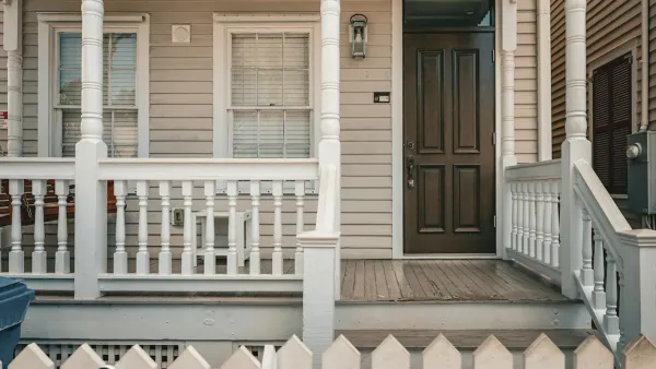Suburban house porch — saving for a down payment in 2026 when mortgage rates are above 6%