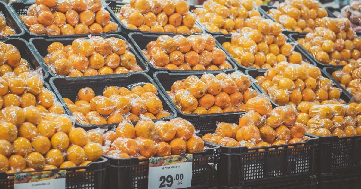 Fresh produce in a grocery store, representing the impact of food inflation on household budgets in 2026